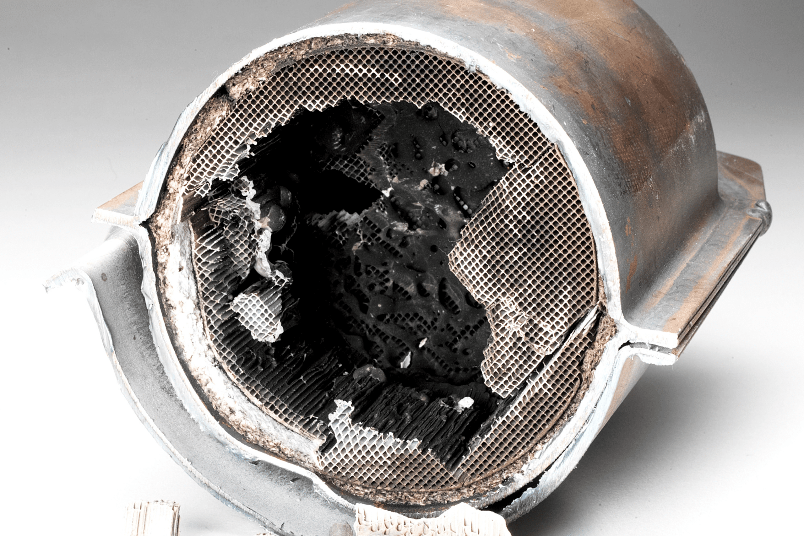 Catalytic converter with precious metals inside