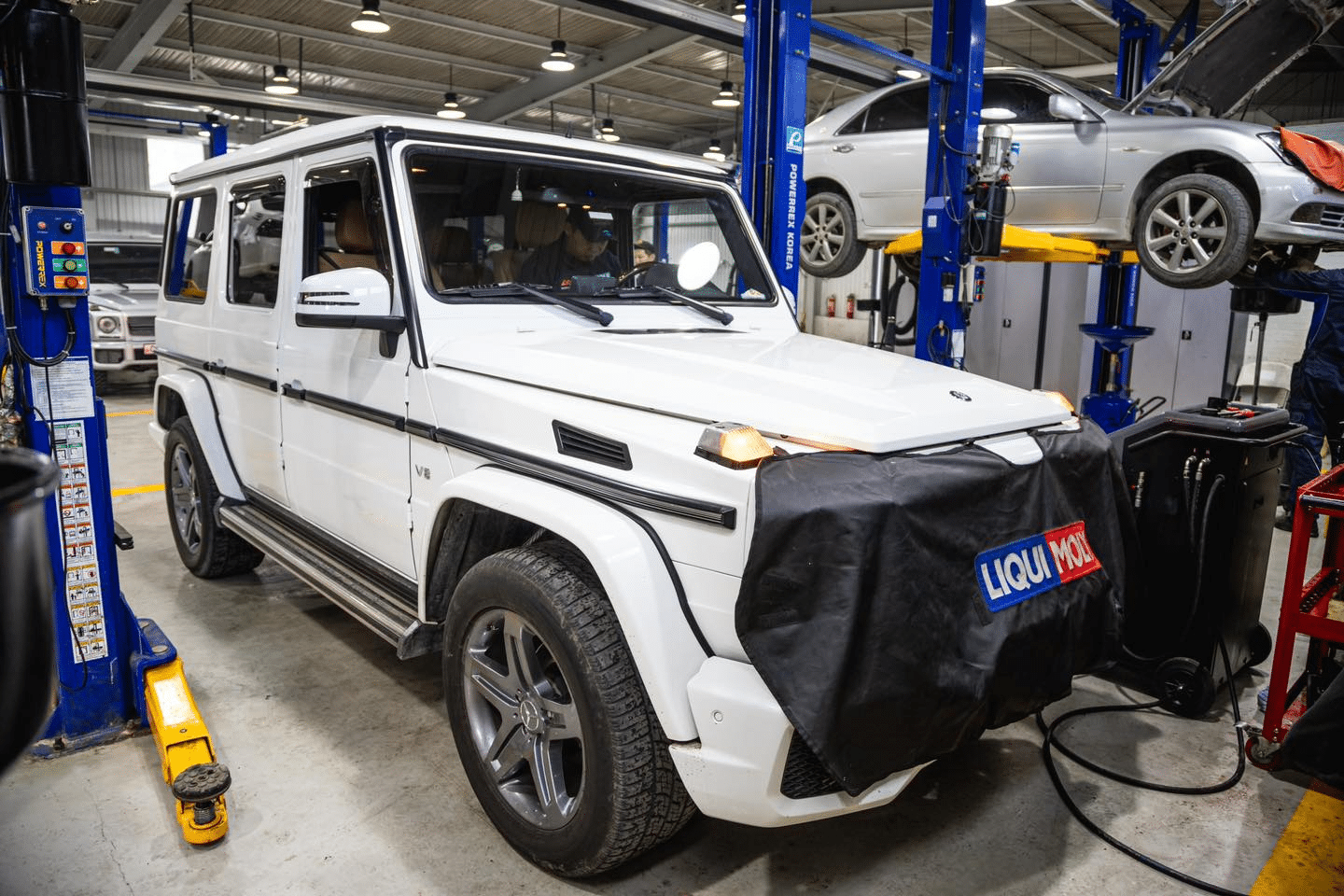 A local mobile mechanic working on a car