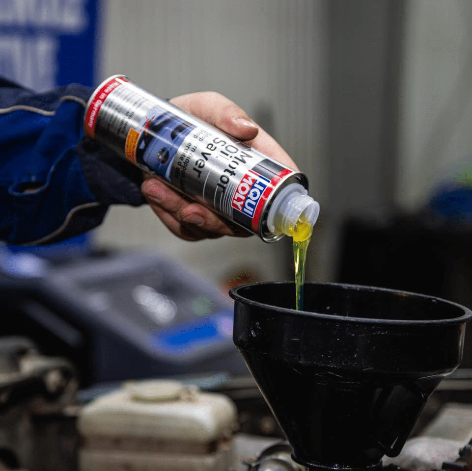 A bottle of Liqui Moly Motor Oil Saver with packaging and size information